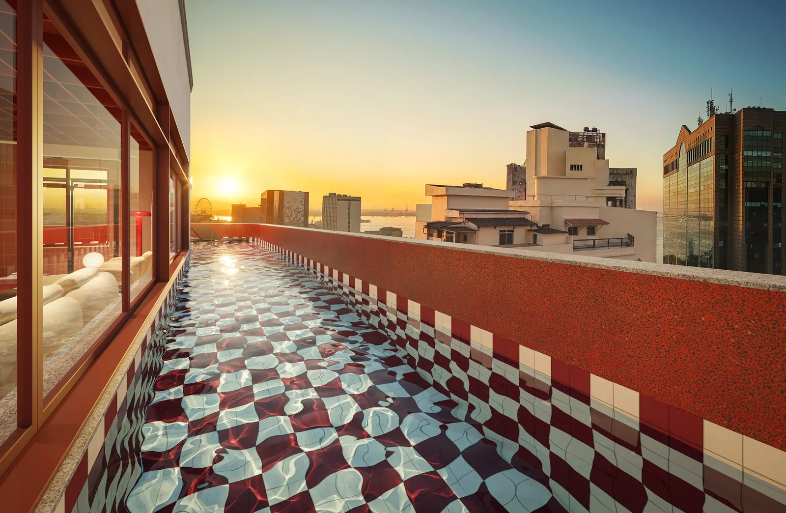 Piscina no rooftop do ARB26 ao pôr do sol